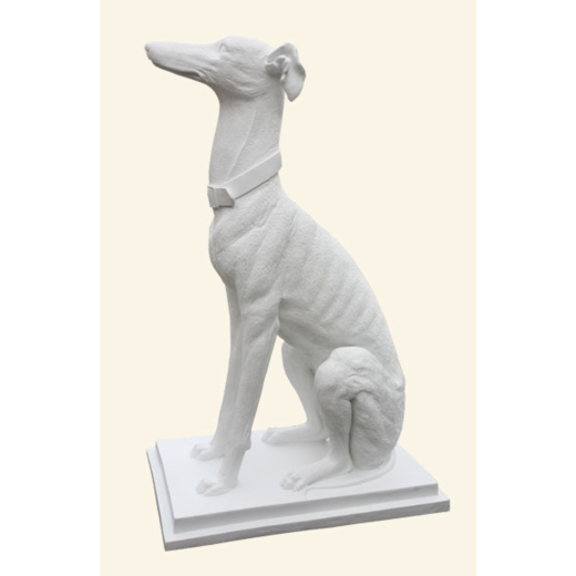 White Decorative Proud Pointer Dog Sitting Proud and Upright
